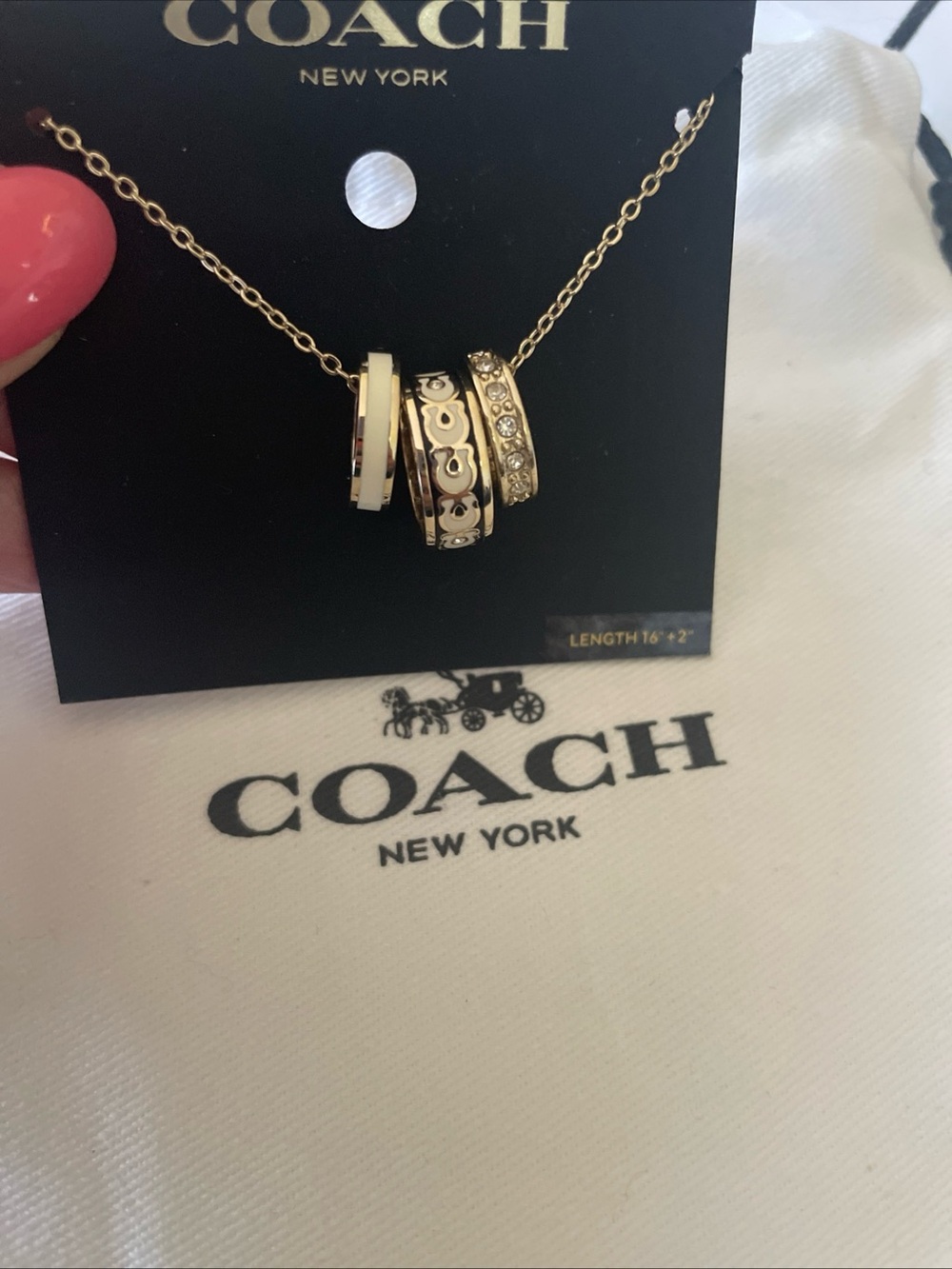 Coach Gold-Tone Triple Ring Pendant Necklace with Crystal Accents
